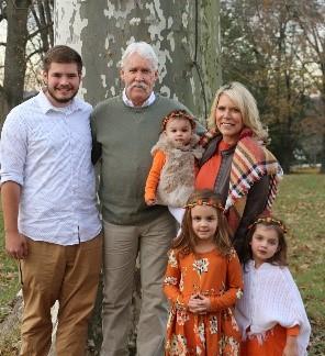 Mrs. Skahill with her family